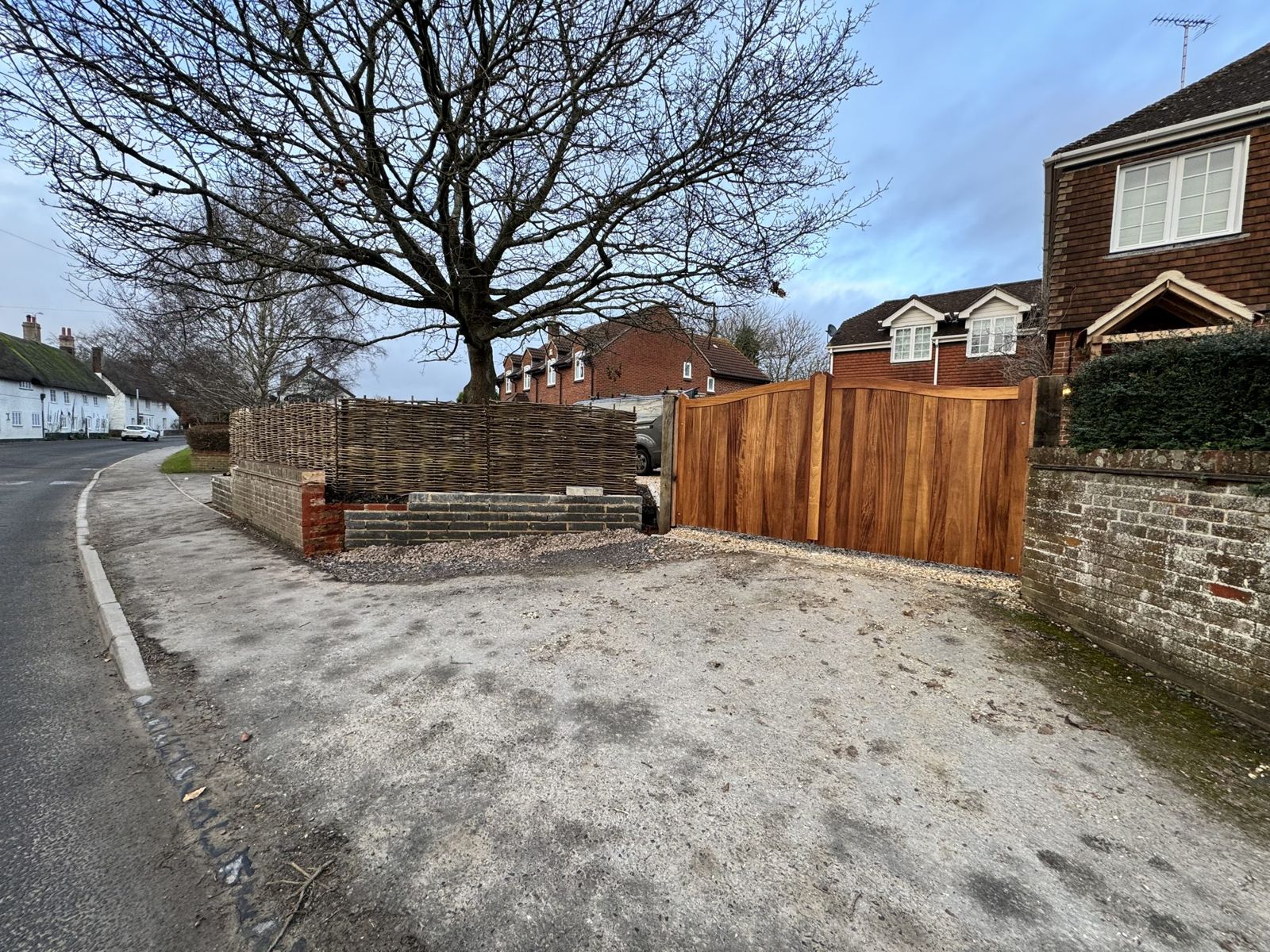 Hardwood gates and new gravel driveway